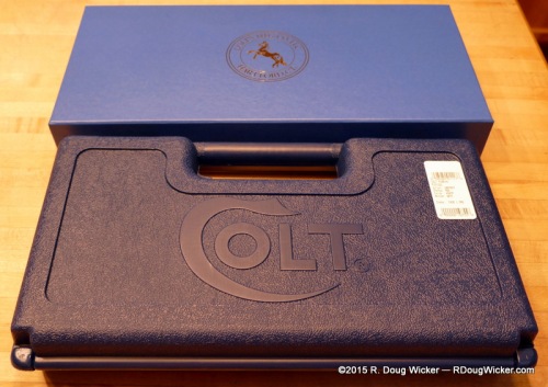 Standard Colt plastic case next to Colt Custom Shop box
